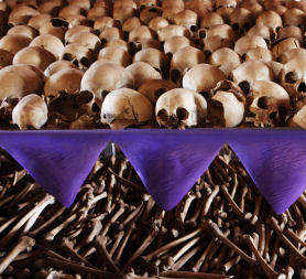 The skulls and bones of Rwandan victims rest on shelves at a genocide memorial inside the church at Ntarama