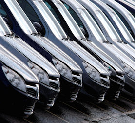 New Vauxhall cars stand outside the company&apos;s factory in Ellesmere Port, northern England (credit: Reuters)