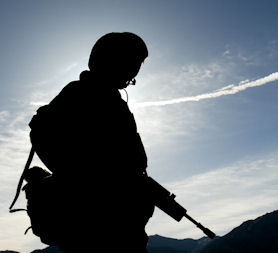 A Royal Marine on duty in Afghanistan, UK death toll now stands at 289. (Credit: Reuters)
