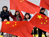 Waving China's flag (Credit: Reuters)