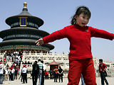 Girl by the Temple of Heaven, Beijing (Credit: Reuters)