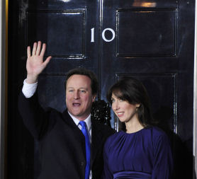 David Cameron arrives in Downing Street (Credit: Reuters)