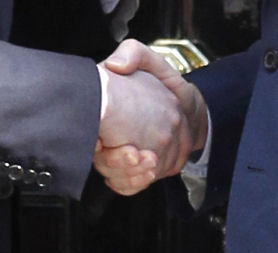 David Cameron and Nick Clegg shake hands outside No.10 Downing Street