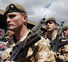 The former head of the British army, General Sir Mike Jackson, condemns defence cuts, as soldiers return from Afghanistan. The 1st Battalion, Royal Anglian Regiment, who returned from a combat tour in Afghanistan, march with bayonets fixed through the London suburb of Barking (Reuters)
