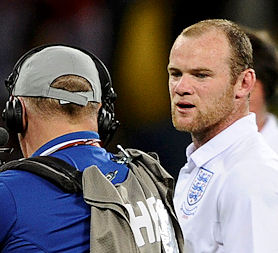 England&apos;s Wayne Rooney lashes out at England fans after the 0-0 draw with Algeria (Reuters)